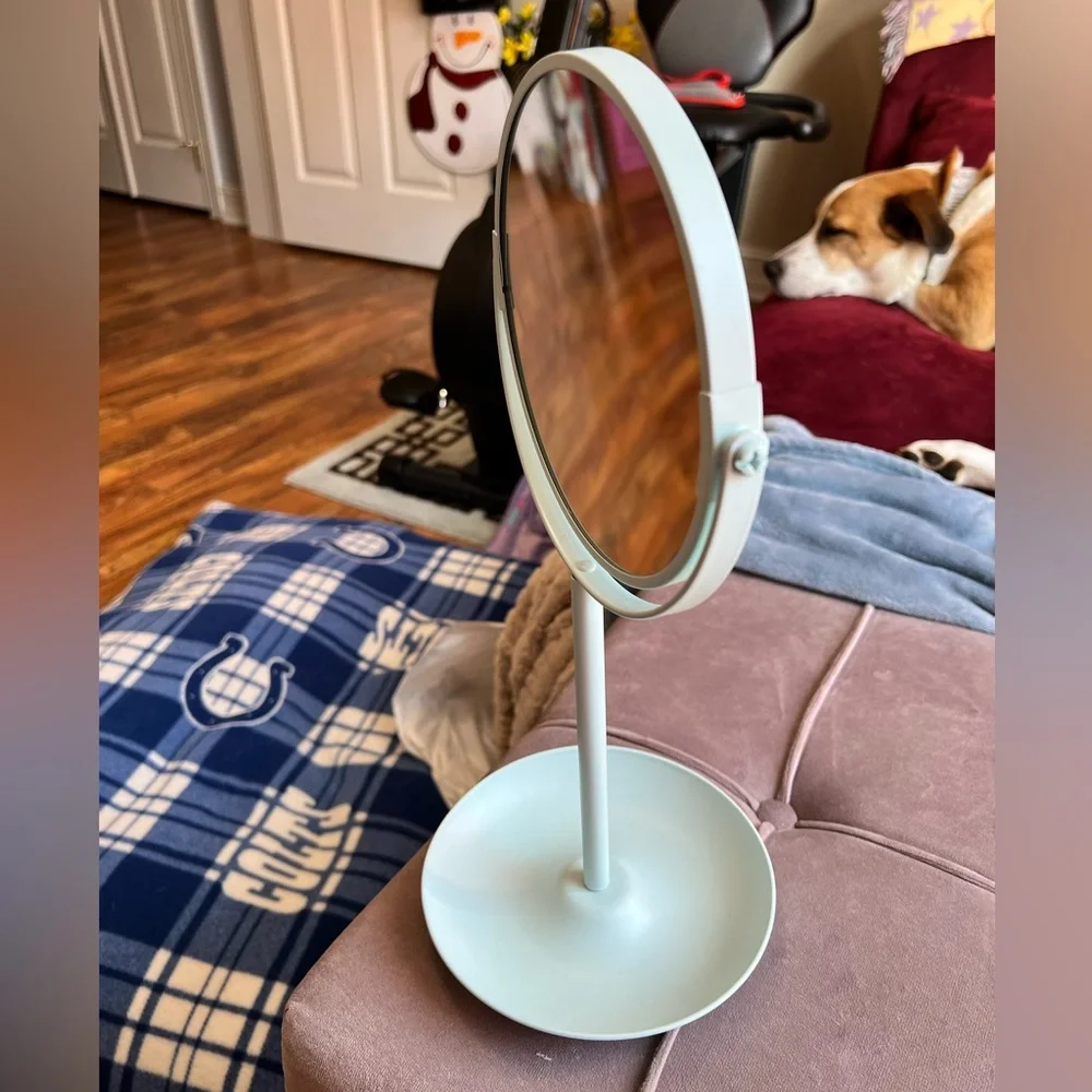 Light teal makeup mirror with handy tray to hold little items